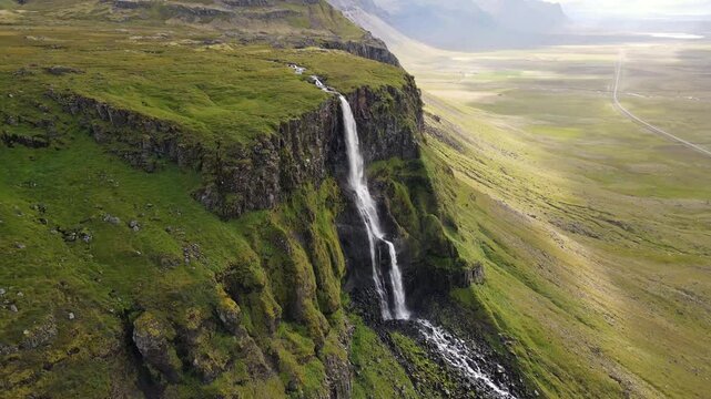waterfall in the mountains, Bjarnafoss, Iceland