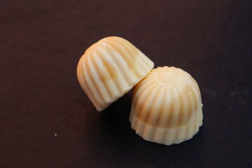 Sweet white chocolate candy close up view.