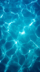 The image is of a body of water with blue waves and ripples. The water appears to be calm and peaceful, with the ripples reflecting the light of the sun. Scene is serene and tranquil