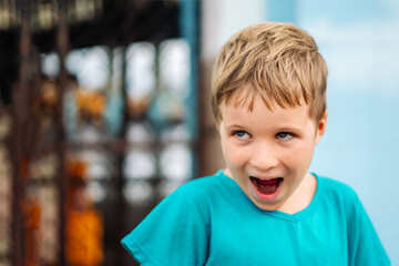 Portrait boy. Happy childhood, sincere emotions, joy of life, family education