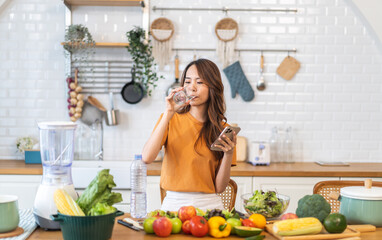 Portrait asian beauty body slim woman drinking water from a bottle while relax and feeling fresh, refresh drink, wellness, diet, healthcare, mineral at home.Healthy liquid lifestyle concept