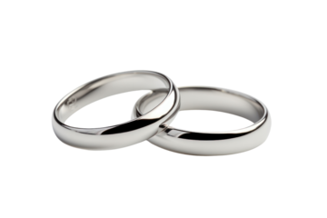 A pair of silver wedding rings with a polished finish, on a white background.