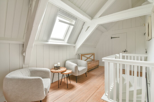 Cozy attic living space with modern furniture