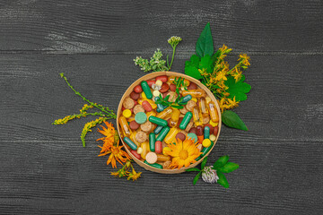 Plant based supplements, natural vitamins, fresh herbs and flowers. Organic ingredients medication