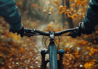 Cyclist Riding the Mountain Bike on the Trail in the Beautiful Summer Forest