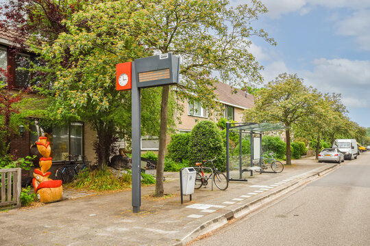 Suburban street scene with bus stop and sculptures
