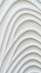 Fototapeta premium Abstract Architectural Detail, Close-Up View of Curved White Building Facade with Decorative Lines