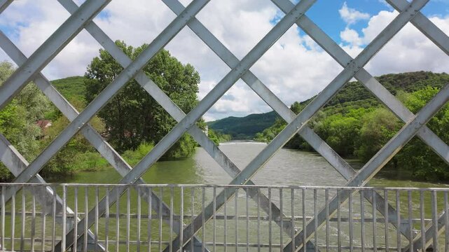 Looking Through Bridge Grating at Doubs River in France