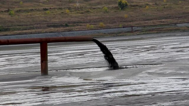 dumping waste into the river
