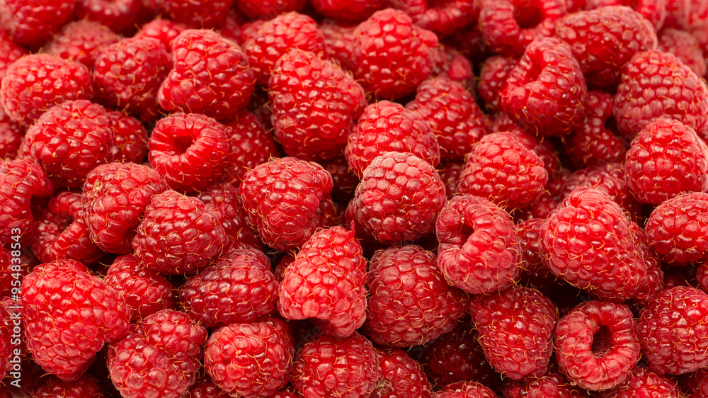 Sticker tasty fresh raspberry as a background.