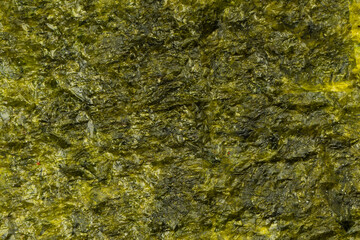 Tasty nori seaweed as a background. Top view.