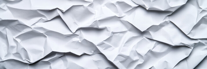 Crinkled grey paper texture with soft shadows giving a delicate worn appearance 