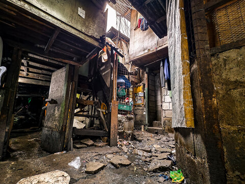 Metro Manila, Philippines - Aug 28, 2024: A typical squatter area in the city. A cramped slum area.