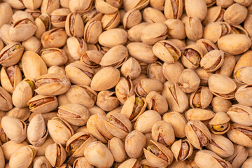 Tasty pistachios isolated on a white background.