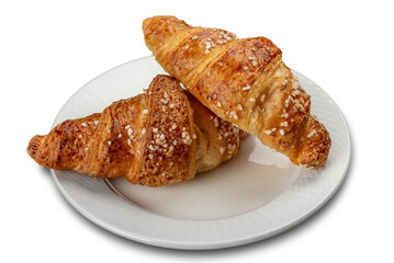 Croissant with granulated sugar on white saucer isolated