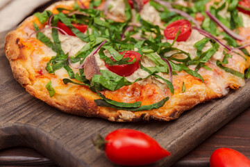 Neapolitan Pizza with Anchovies, Capers, and Fresh Greens