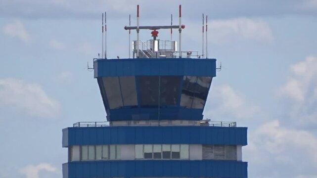 heavily zoomed-in close-up control tower airport, showing intricate soft airport management tower lighting tower structure airport landmark backlit close up architecture
