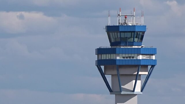 close-up aerial shot right side airport control tower focuses structural design elements that make control tower critical component airport's aerial view close-up architecture aviation