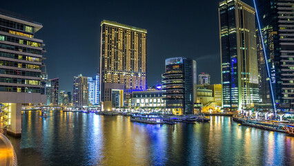 Dubai Marina towers and canal in Dubai night timelapse hyperlapse