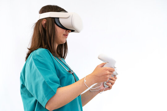 Female doctor using virtual reality headset on white background.