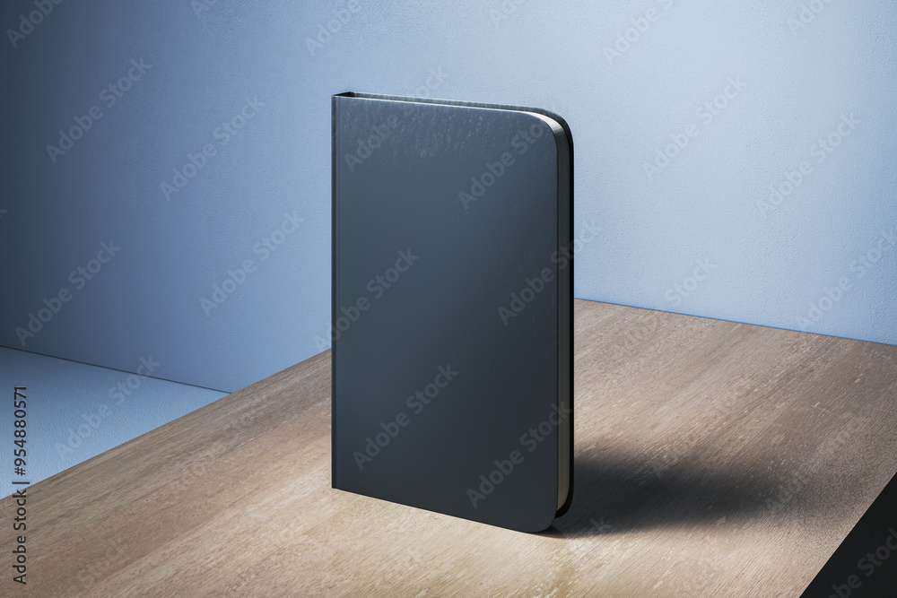 Poster Empty closed black notebook with mock up place on wooden desk and concrete wall background background. Back to school, education and supplies concept. 3D Rendering.