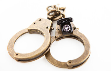 image of phone handcuffs white background