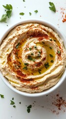 Close-up of Creamy Hummus with Olive Oil, Paprika, and Parsley