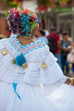 Young latin girl dressed in traditional folk dress, La Pollera, national dress in Panama, Central America - stock photo