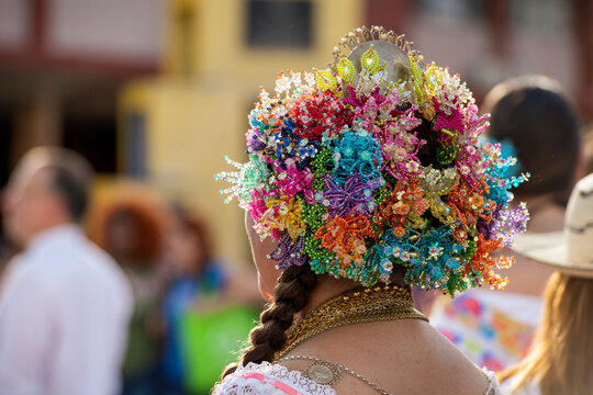 Young adult woman wearing a traditional pollera national costume, adorned with tembleques and gold jewelry, participating in a cultural event, celebrating panama's rich heritage, Panama - stock photo