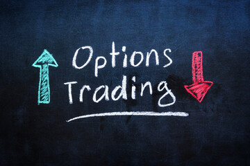 Chalkboard with options trading written in chalk. Financial education and investment strategies.