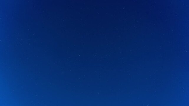 night timelapse. starry sky. starlink flying satellites