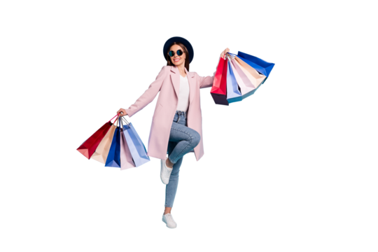 100% sales! Full body photo of enthusiastic candid lady in eyewear eyeglasses go shopping buy purchases wear pink coat denim jeans isolated over blue background