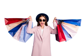 Portrait of astonished funny lady in eyewear eyeglasses go shopping find wonderful bargain hold bags scream wow omg wear season coat isolated over blue color background
