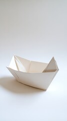 A delicate origami boat floats gracefully, reflecting creativity and simplicity in design, capturing the essence of handmade artistry