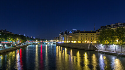 Cite island view with Conciergerie Castle and Pont au Change, over the Seine river timelapse hyperlapse. France, Paris