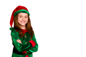 Portrait of cheerful elf kid with her hands crossed smiling ready to help in christmas night wearing green hat fantasy costume isolated over red background