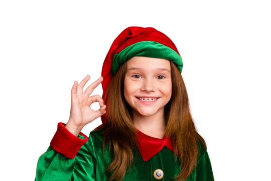 Close up photo of charming elf kid in green hat with long red head haircut showing ok sign recomme3nd eve noel event wearing fairytale cap costume isolated over red background