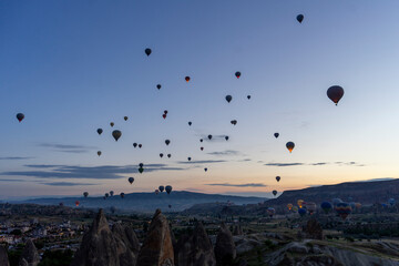 Cappadocia, Turkey is a great place to see hot air balloons during takeoff time.