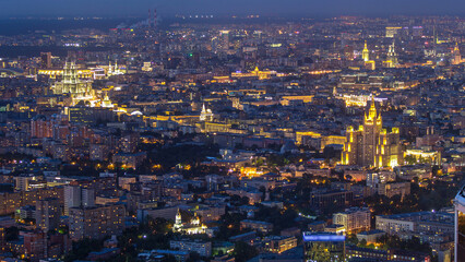 Aerial top view of Moscow night timelapse after sunset. Form from the observation platform of the business center