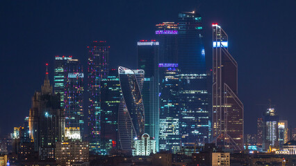 Fototapeta premium Stalin skyscrapers night timelapse, Moscow International Business Center and panoramic view of Moscow