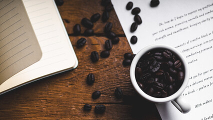 Notepad, Pen, and Coffee Beans in a Cup on a Wooden Surface