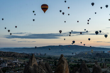 Hot air balloons rising early in the morning