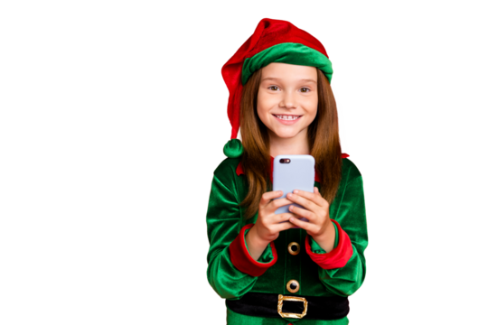Portrait of cheerful elf with long red head hairstyle use cell phone gadget read newyear post wearing green hat cap costume isolated over red background