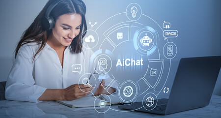 Woman using AI chat interface on laptop in office setting.