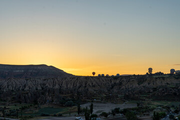 Obraz premium Hot air balloons rising early in the morning