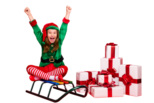 Portrait of her she nice attractive cheerful overjoyed pre-teen elf Santa Claus look sitting on sled lotus pose position rising hands up rejoice isolated over bright vivid shine red background - Powered by Adobe