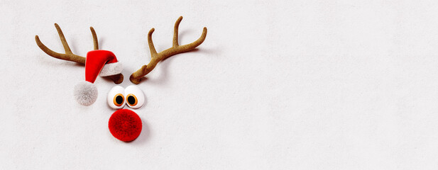 Cute Reindeer with red nose and Santa hat on white Christmas background 3D Rendering, 3D Illustration