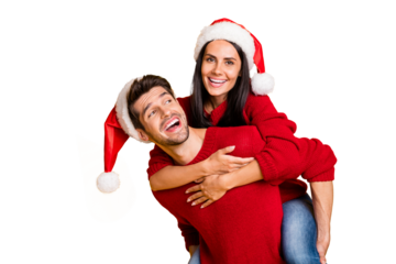 Portrait of cheerful man hug his sweetheart piggyback laugh wear red pullover isolated over yellow background