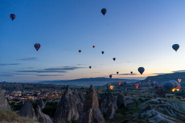 Hot air balloons rising early in the morning