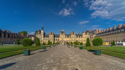 Obraz premium Beautiful Medieval landmark - royal hunting castle Fontainbleau timelapse hyperlapse.